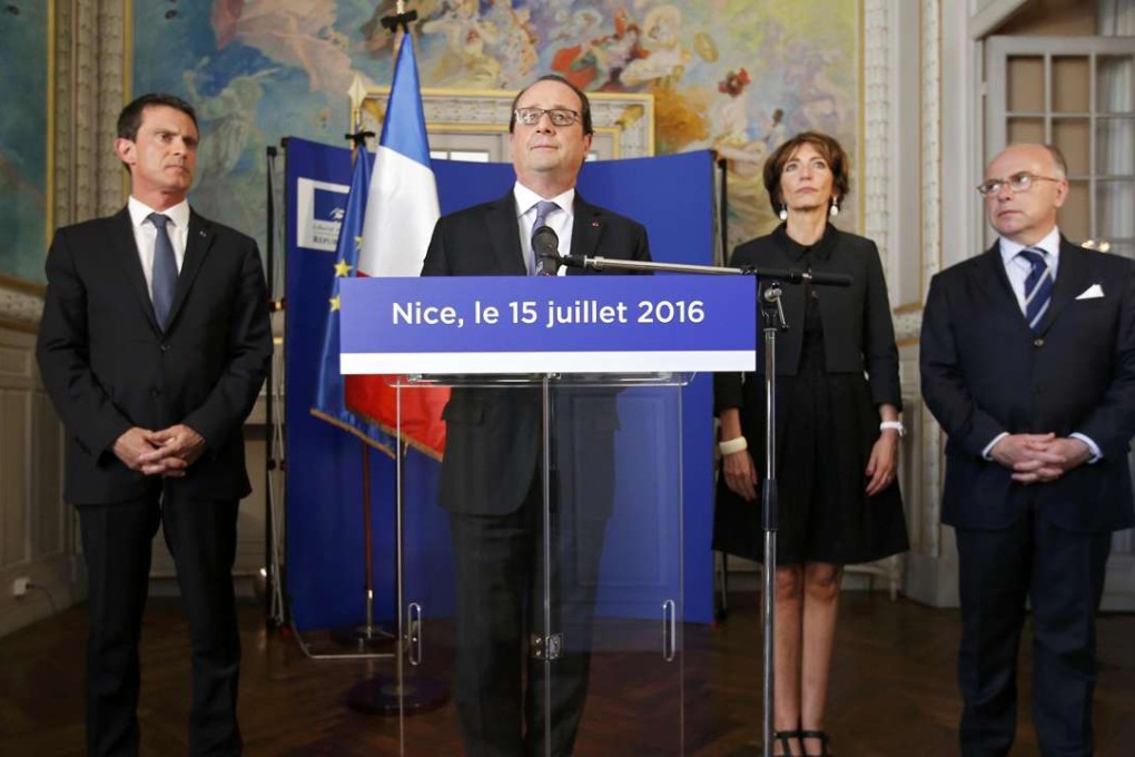 French President Francois Hollande with Prime Minister Manuel Valls (left), Interior Minister Bernard Cazeneuve (right) and Minister of Health Marisol Touraine as he speaks to journalists at Prefectoral Palace. Photo: Reuters