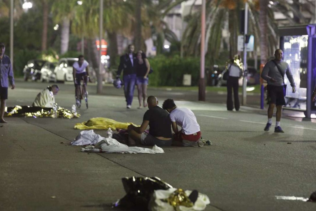 Bodies are seen sprawled on the ground after at least 30 people were killed in Nice, France, when a truck ran into a crowd celebrating the Bastille Day national holiday. Photo: Reuters