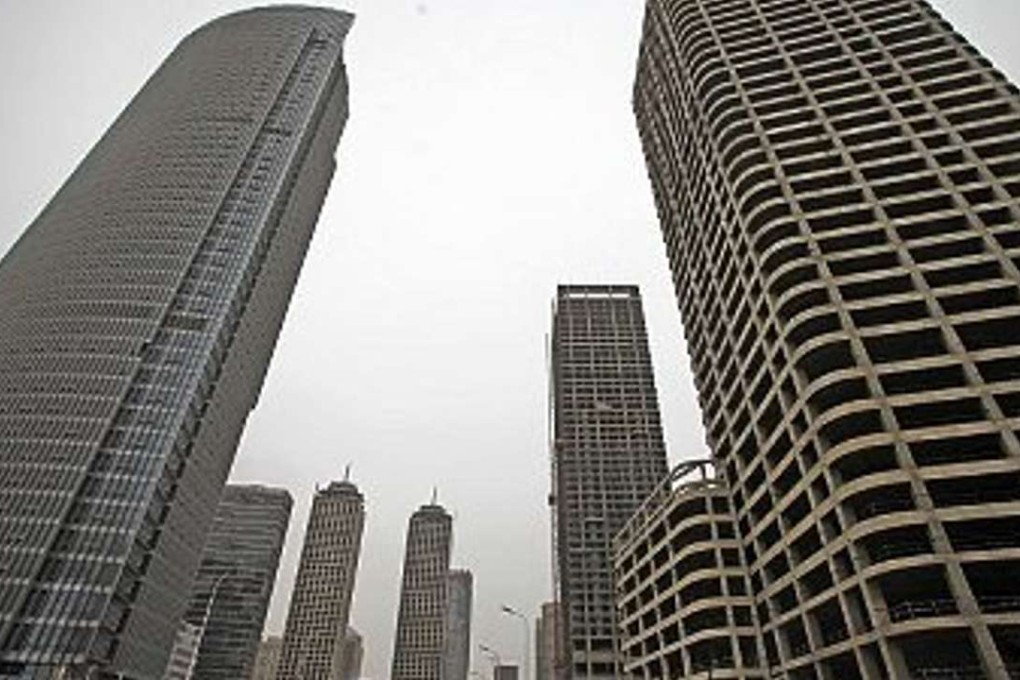 Empty new commercial buildings in the Chinas Manhattan Project in Binhai New Area, Tianjin. Unrealistic expectations of growth have created ghost towns across the country and even within major cities. Photo: Imaginechina