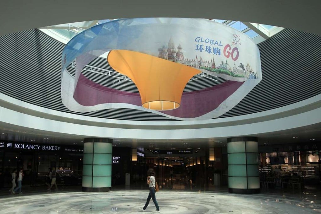 The darkened halls of the Global Go shopping centre in Yujiapu district in Tianjin. Photo: Simon Song