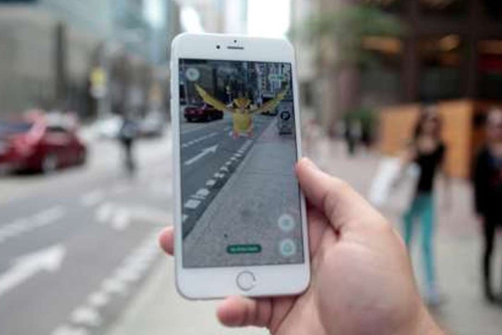 A “Pidgey” Pokemon is seen lurking on a Toronto street, overlaid on the screen of the Pokemon Go mobile app, Nintendo’s new scavenger hunt game which utilizes geo-positioning to bring the hunt for Pokemon monsters into the real world. Photo: Reuters