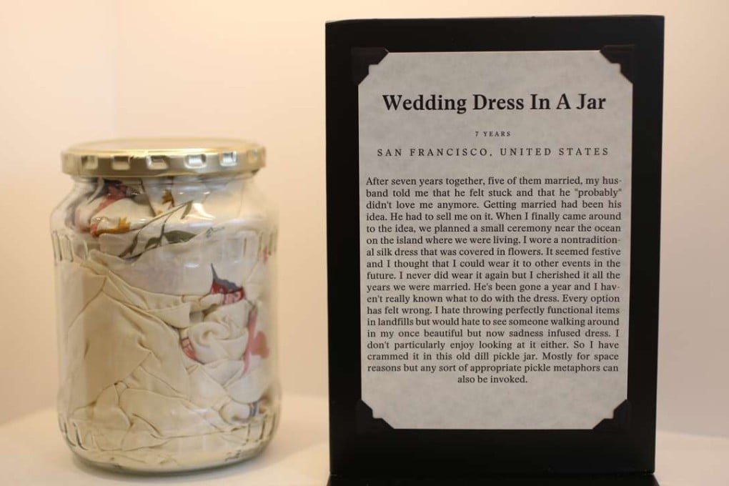 The Museum of Broken Relationships received this wedding dress stuffed into a pickle jar after a marriage went sour. Picture: Iris Schneider for The Washington Post.