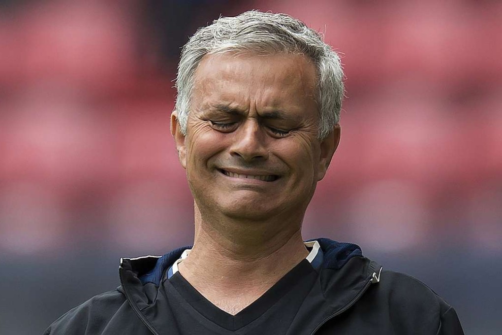 Manchester United's Portuguese manager Jose Mourinho reacts during the pre-season friendly football match between Wigan Athletic and Manchester United. AFP