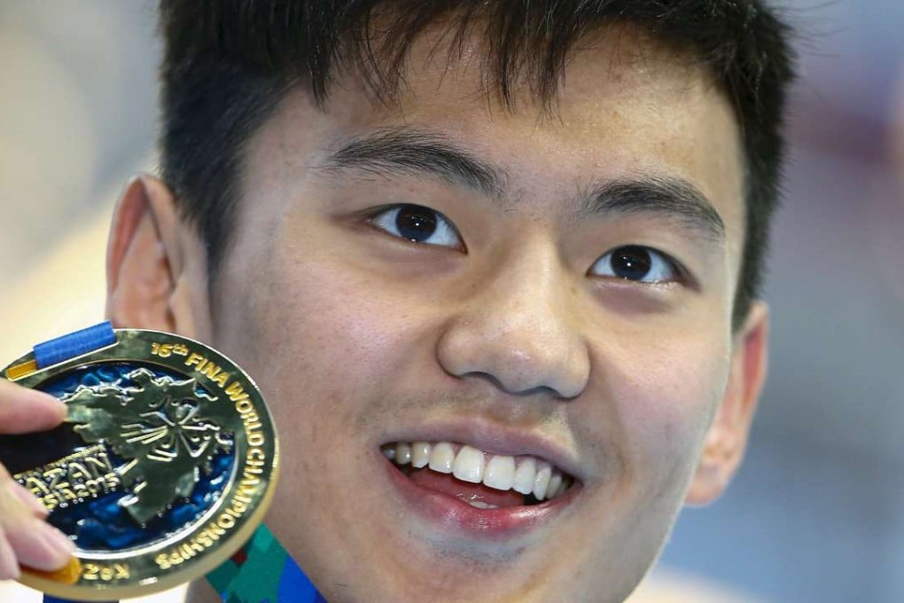 Ning Zetao of China poses with his gold medal after winning the men's 100m freestyle final at the Aquatics World Championships in Kazan, Russia in August 2015. Photo: Reuters