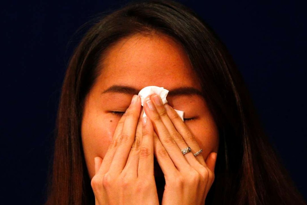 Thailand'sRatchanok Intanon cries during a news conference at a hotel in Bangkok. Photo: Reuters
