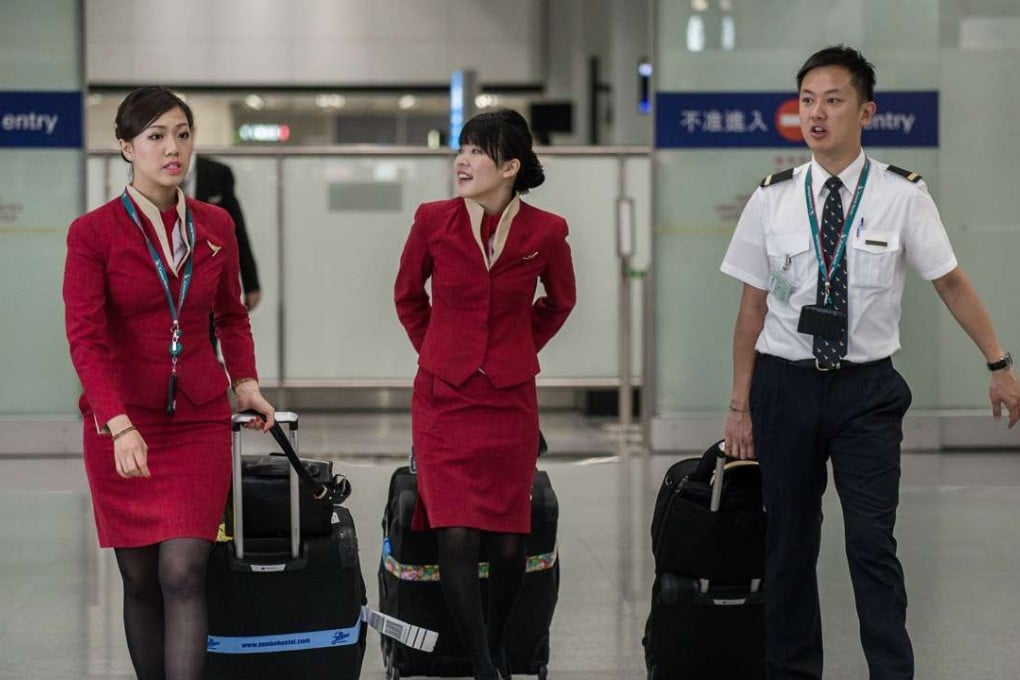 Cathay Pacific has raised the ceiling on retirement for flight attendants to 55. Photo: AFP