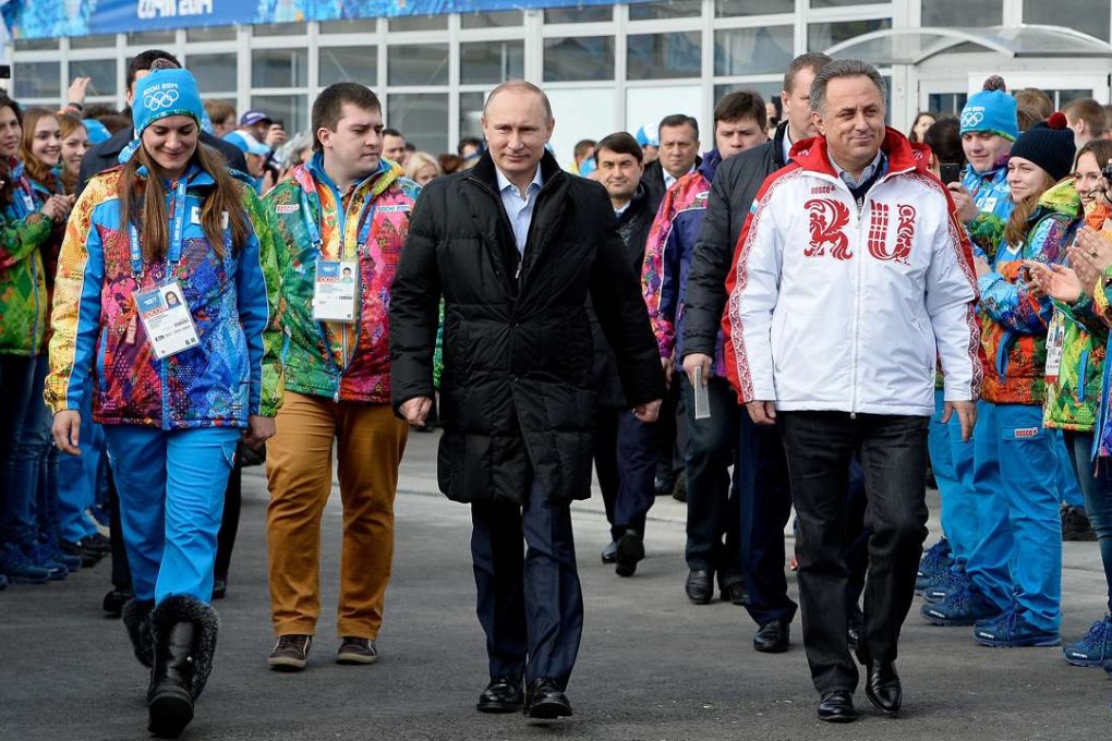 Flashback: Russian President Vladimir Putin and Sports Minister Vitaly Mutko basked in the limelight of hosting the Sochi Winter Olympic Games in February 2014 – now it has been revealed that a state-sponsored system allowed drug cheats to compete at those Games. Photo: AP