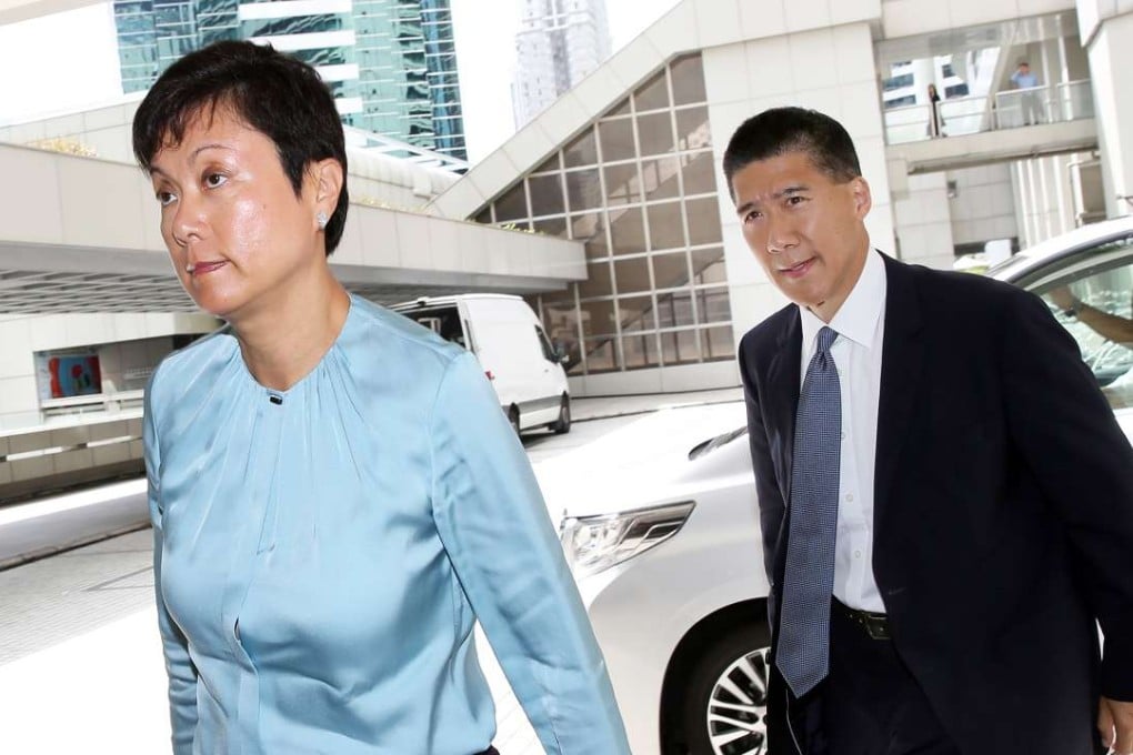 The twins’ father, businessman Carl Lu (right), and mother appear at the High Court in Admiralty on Wednesday. Photo: Sam Tsang