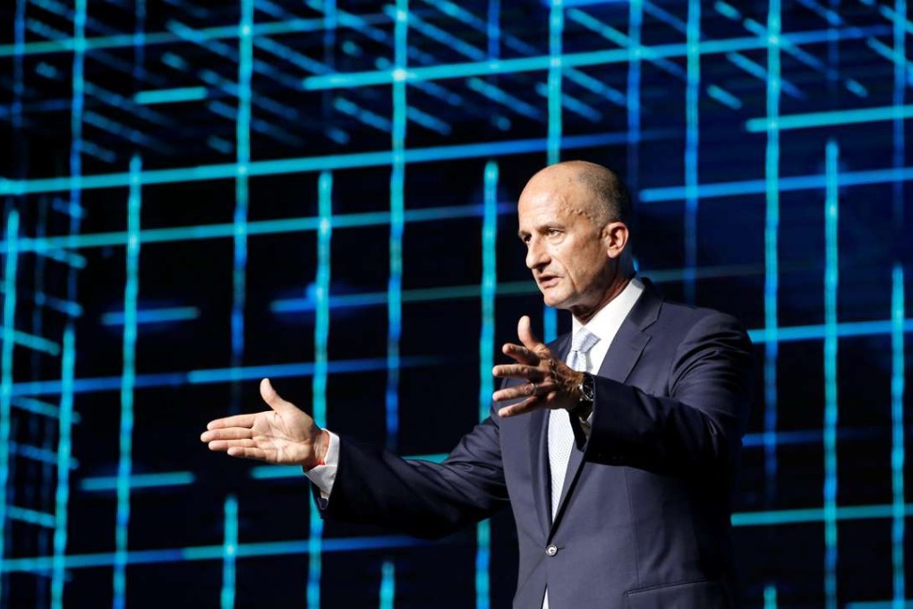 General Electric Vice Chairman John Rice speaks at the GE Minds and Machines Summit in Shanghai on July 20, 2016. Photo: Reuters