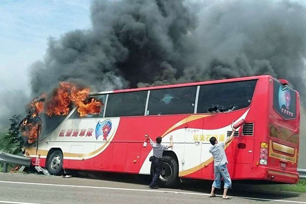 The fire broke out in the front of the tour bus after it crashed on the road leading to Taiwan Taoyuan International Airport on Tuesday. Photo: SCMP Pictures