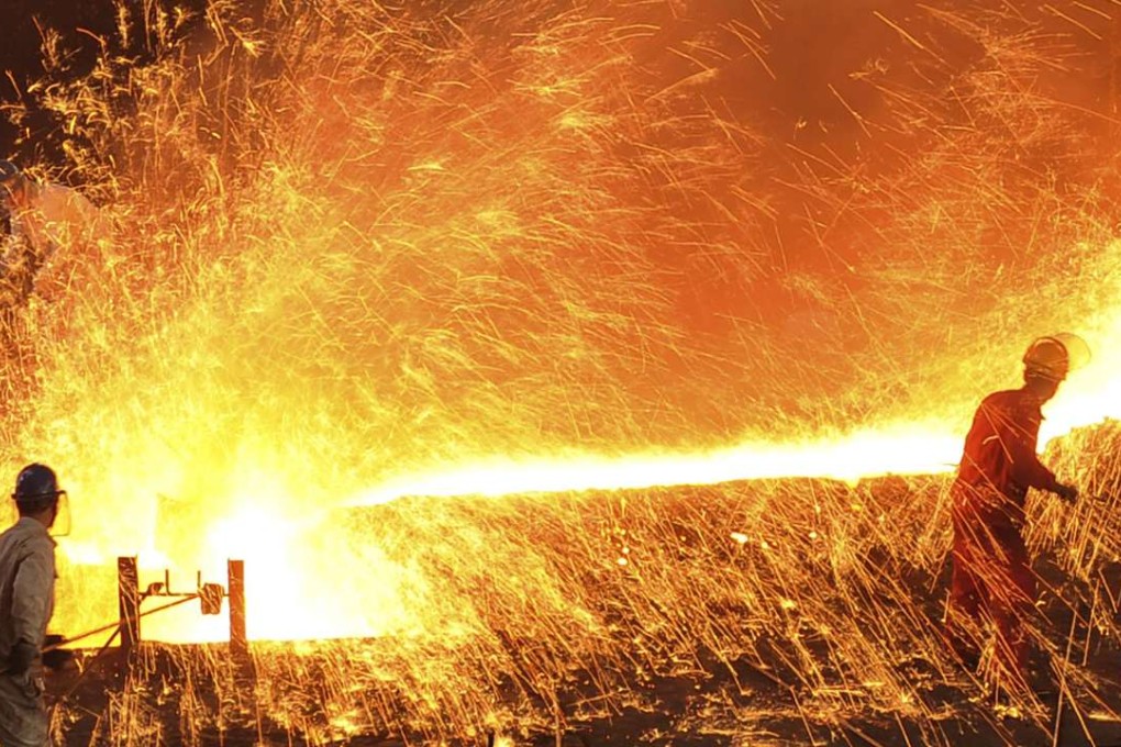 Furnace workers at the troubled Dongbei Special Steel Group in Dalian, Liaoning province. Photo: Reuters March 16, 2015. China's crude steel output fell 1.5 percent to 130.5 million tonnes for the first two months of 2015, government data showed on March 11, as a supply glut and slower demand growth led mills to bring forward scheduled maintenance to curb output. Picture taken March 16, 2015. REUTERS/China Daily (CHINA - Tags: BUSINESS) CHINA OUT. NO COMMERCIAL OR EDITORIAL SALES IN CHINA