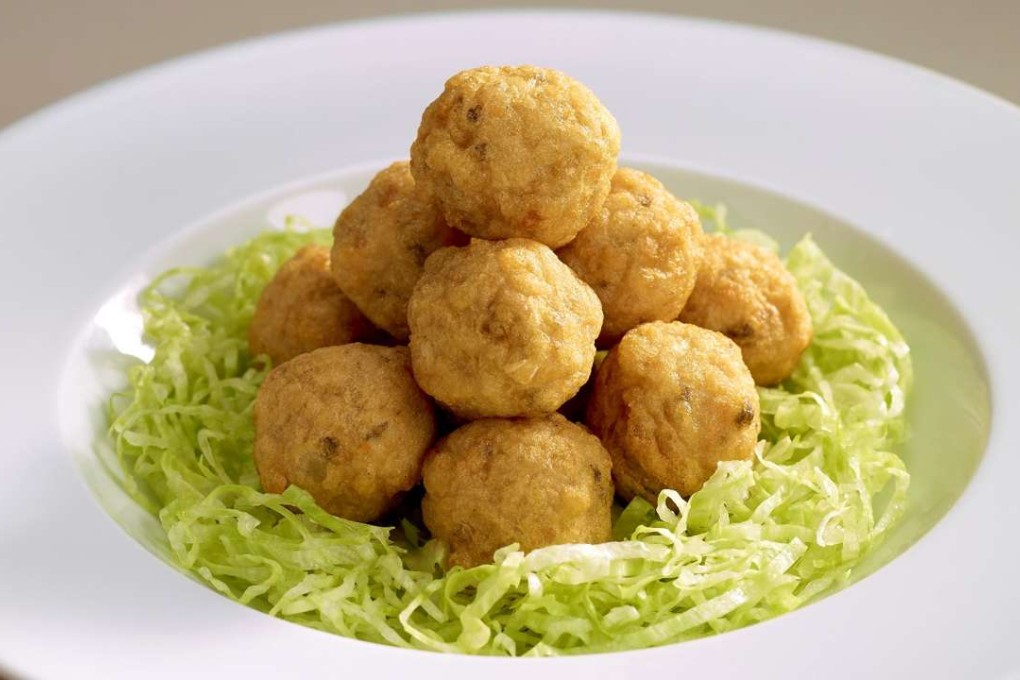 The Royal Garden Chinese Restaurant's deep-fried carp dumplings with preserved clam sauce.