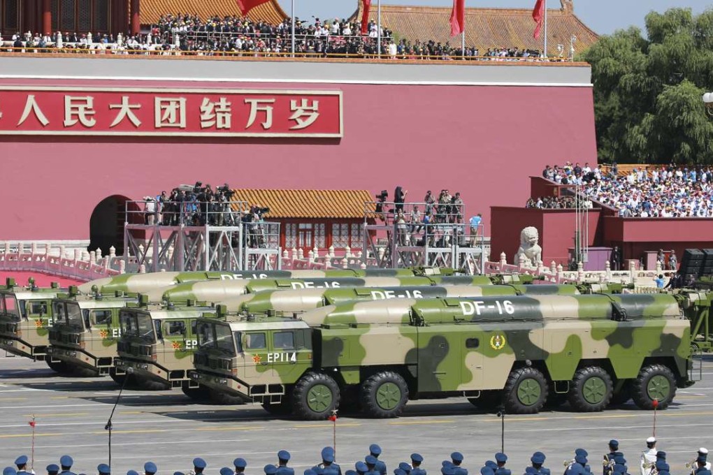 Military vehicles carry DF-16 ballistic missiles in Tiananmen Square last September. Photo: Imaginechina