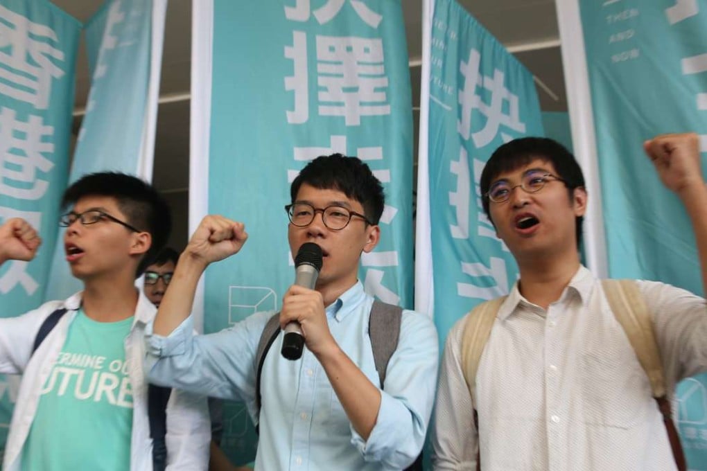 Wong, Law and Chow Yong-kang outside Eastern Court on Thursday before learning their verdicts. Photo: Sam Tsang