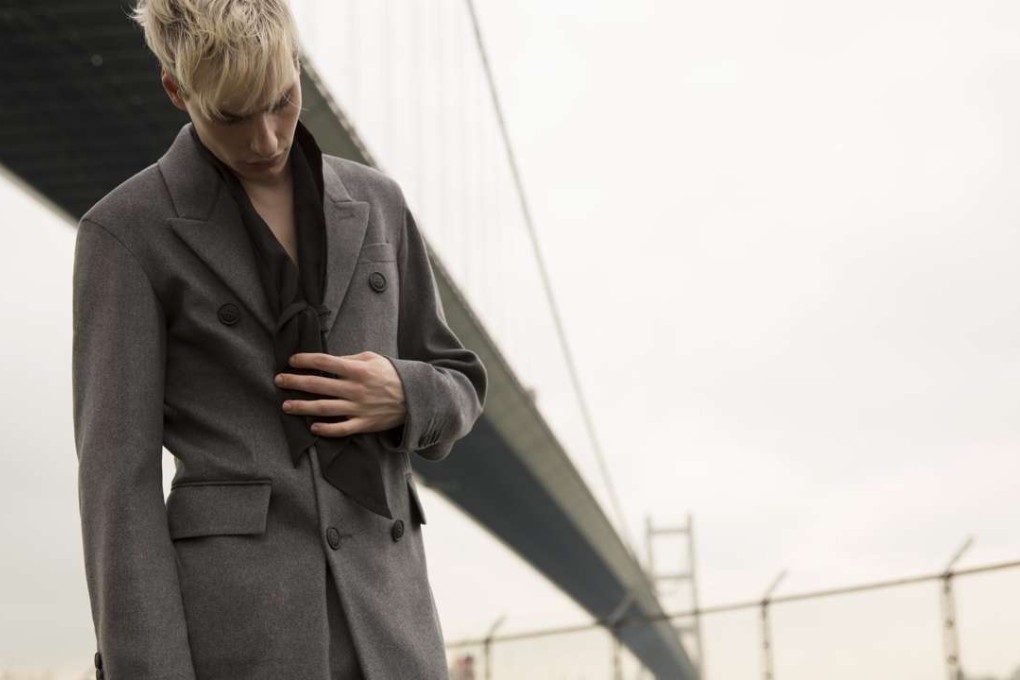 Double-breasted coat (HK$26,000) by Burberry. Silk scarf (HK$2,100) by Giorgio Armani.