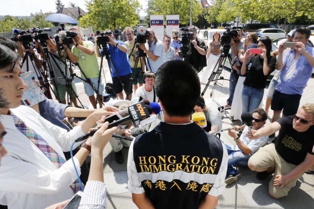 Kenneth Tong of the Hong Kong Immigration Centre, updates the media on the status of the Hong Kong citizens who were injured in an axe and knife attack in Wuerzburg, Germany. Photo: AP