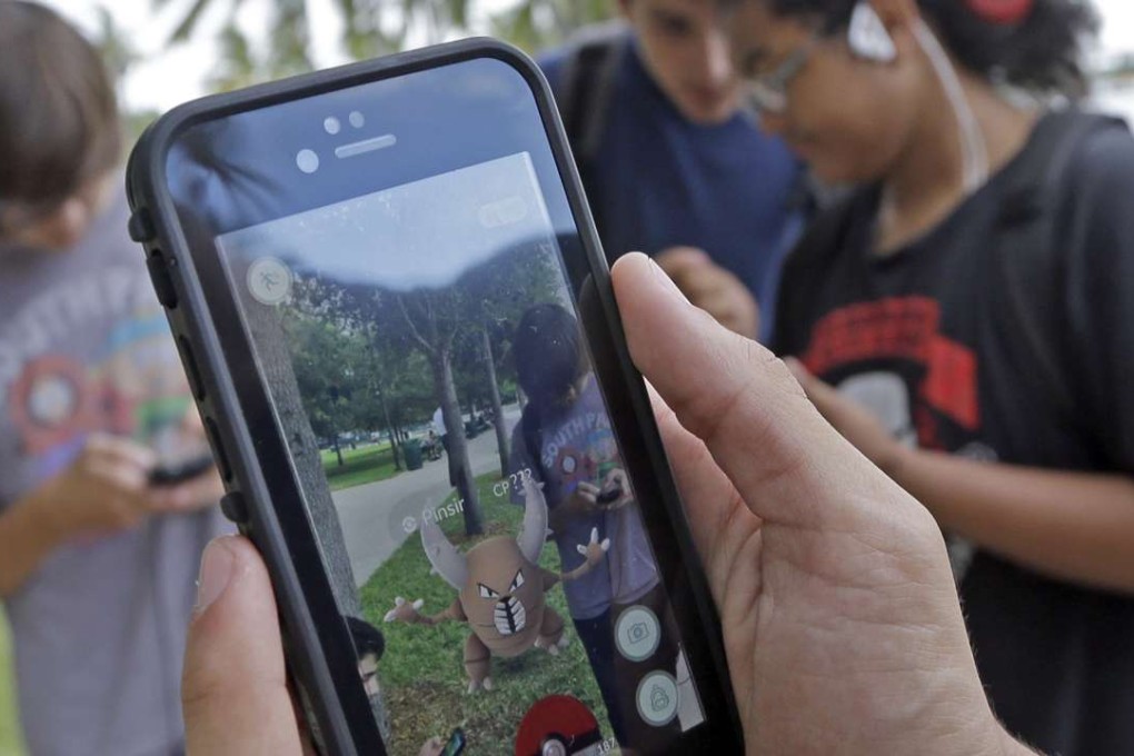 A group of Pokemon Go players at Bayfront Park in downtown Miami. Photo: AP