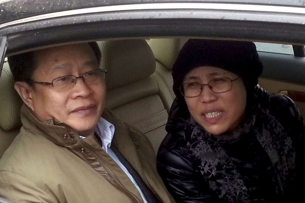 Mo Shaoping(left) in a file photo with Liu Xia, wife of Nobel Peace Prize laureate Liu Xiaobo. Photo: AFP