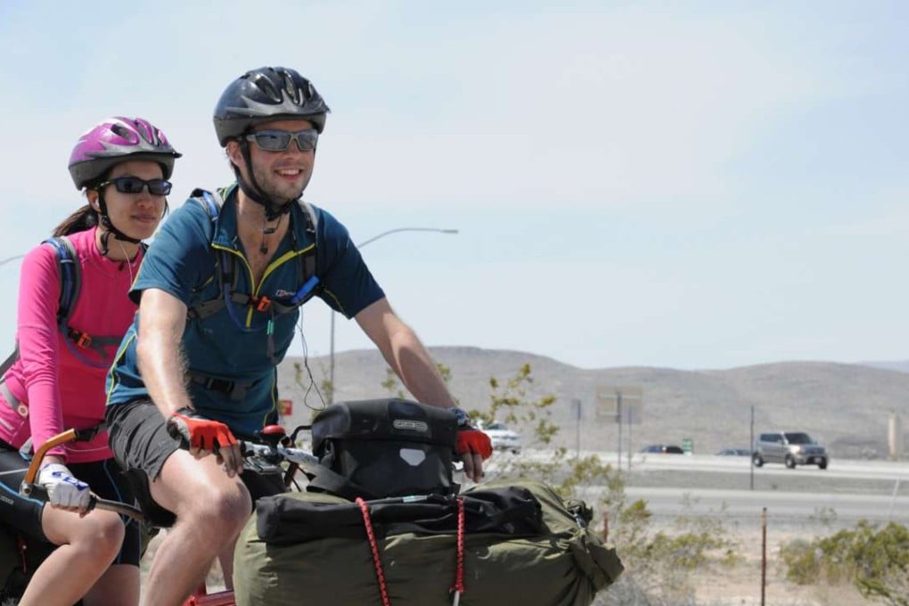 Christine and Rob Lilwall riding through the Las Vegas desert.