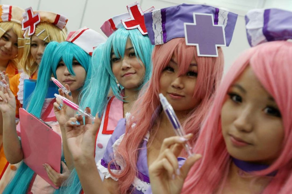 Cosplayers get dressed up for the annual Ani-Com & Games Hong Kong at Hong Kong Convention and Exhibition Centre in Wan Chai. Photo: Sam Tsang