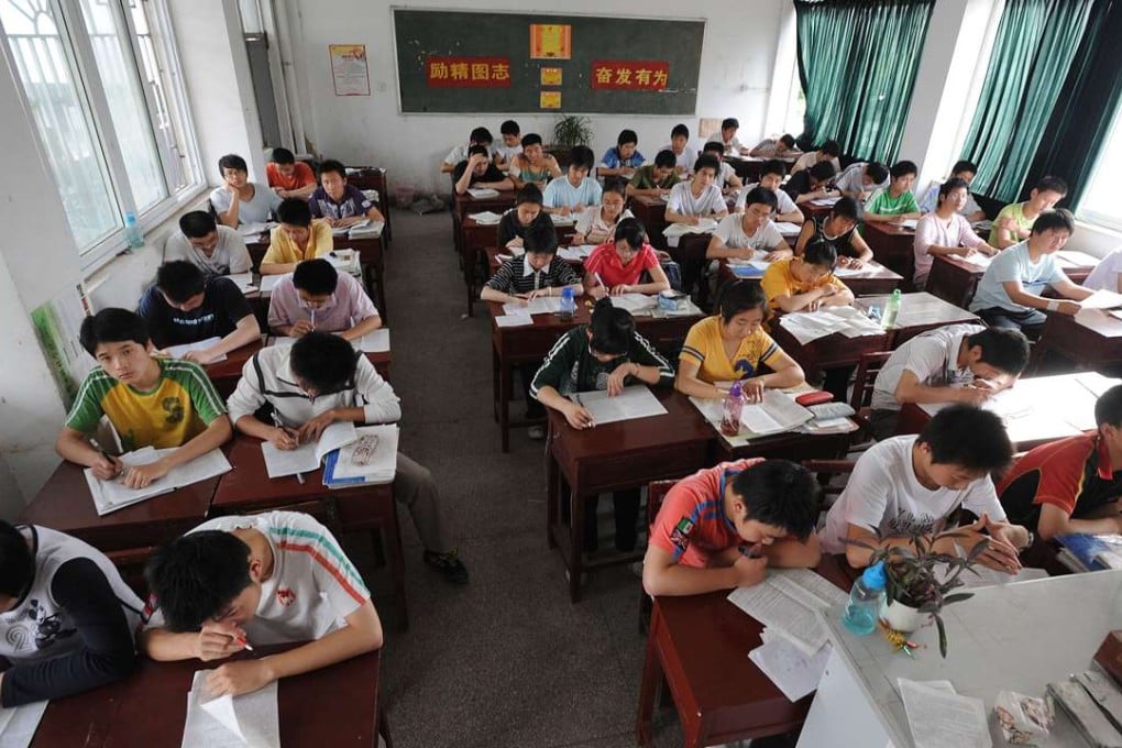 Students in Anhui province prepare to take China’s national college entrance examination. In his latest book, Han Han blasts the Chinese education system and its teachers as “terrible”. Picture: AFP