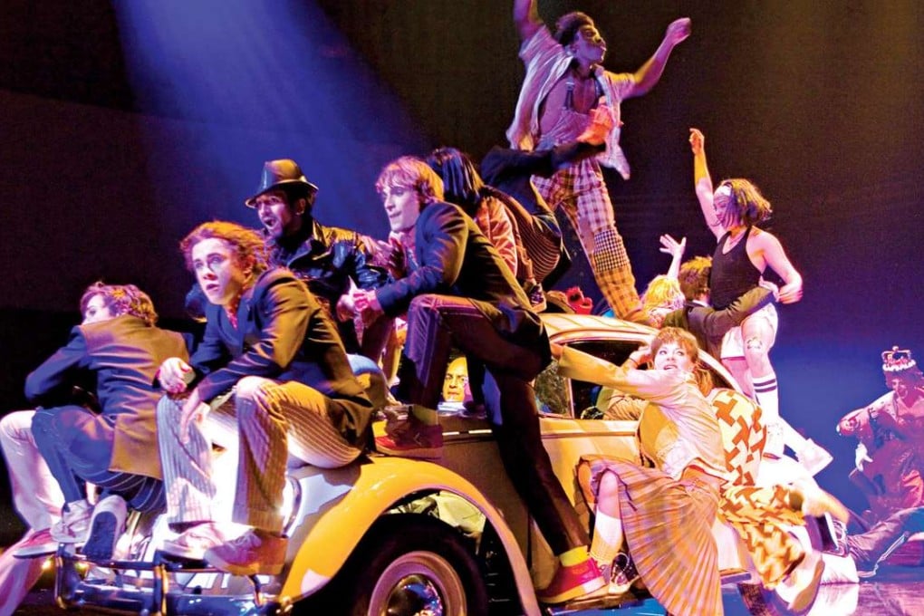 The cast of The Beatles Love in action.