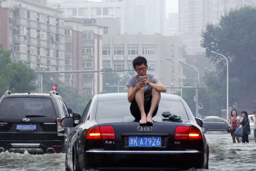 Heavy rain in the past two weeks led to floods and landslides in Hunan and Anhui. Photo: Reuters