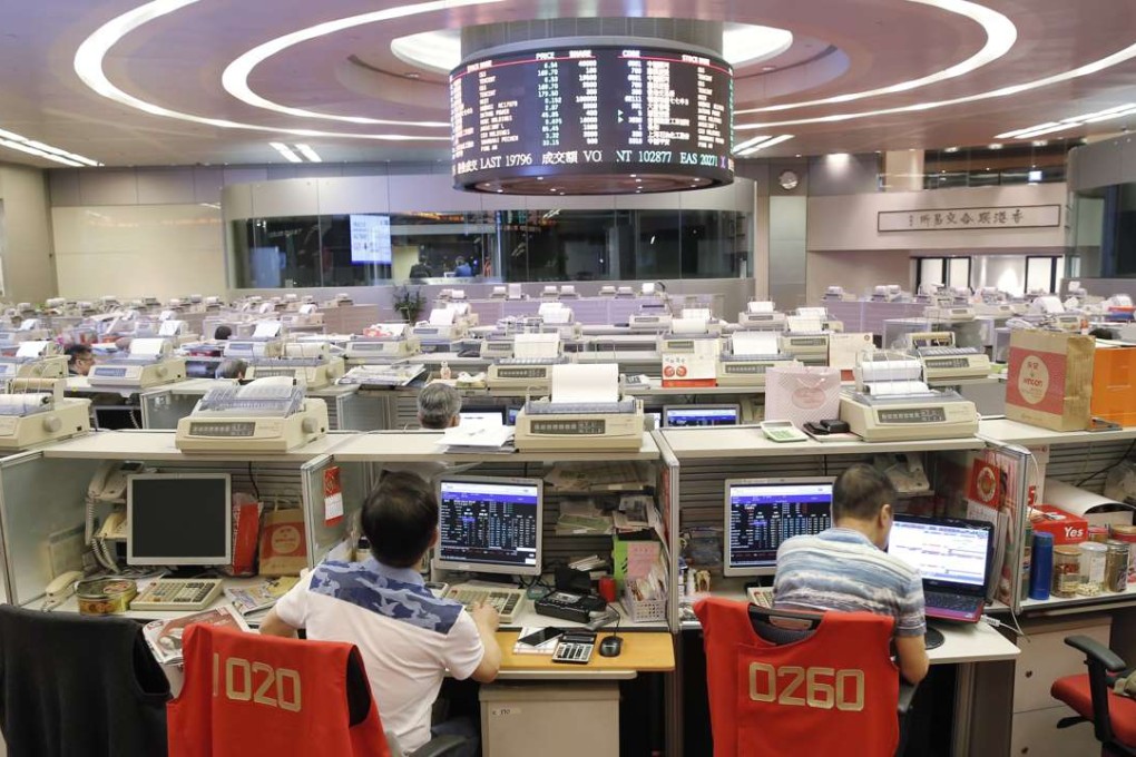 HKEX said 290 brokers took part and 282 stocks were traded in the closing auction session, amounting to a turnover of HK$1.1 billion, or 2.2 per cent of the full-day’s turnover. Photo: AP