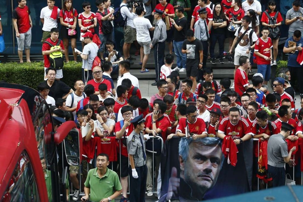 Manchester United fans at the team hotel in Beijing. Photo: Reuters