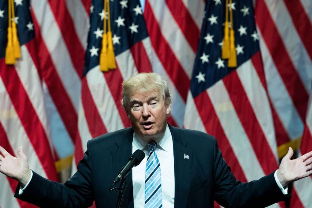 Republican presidential candidate Donald Trump speaks before introducing his newly selected vice presidential running mate Mike Pence, governor of Indiana, during an event at the Hilton Midtown Hotel in New York City. Photo: AFP