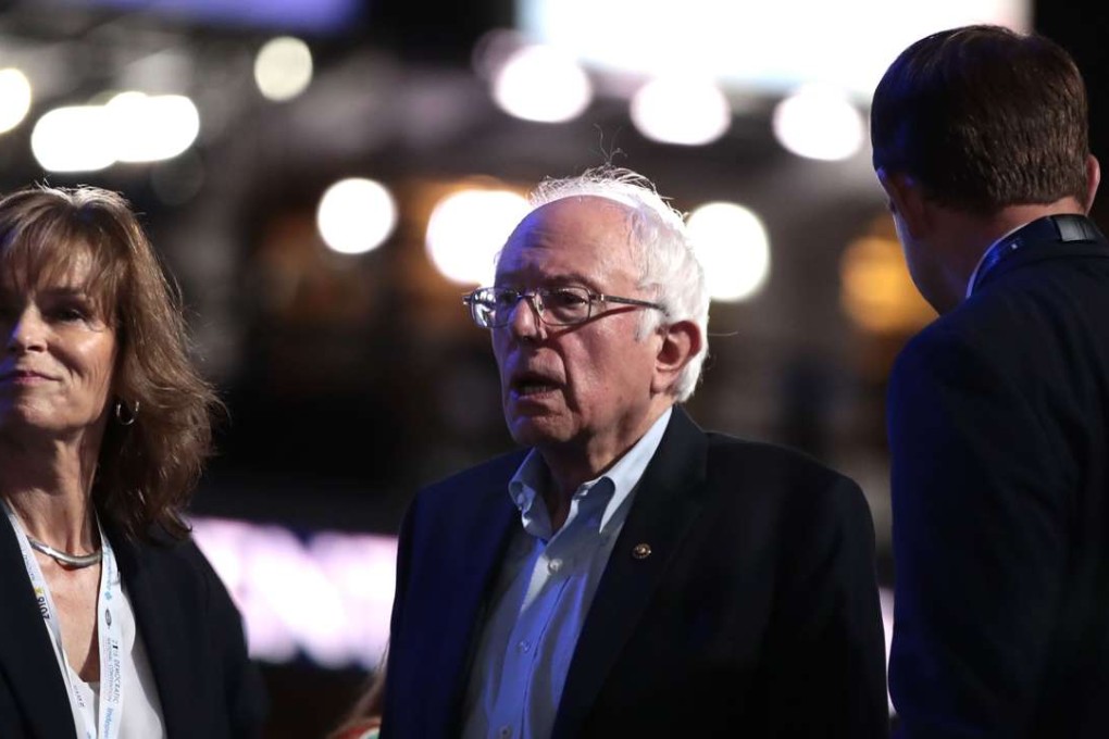 Senator Bernie Sanders (I-VT) stands on stage prior to the start of the first day of the Democratic National Convention at the Wells Fargo Center in Philadelphia, Pennsylvania. Photo: AFP