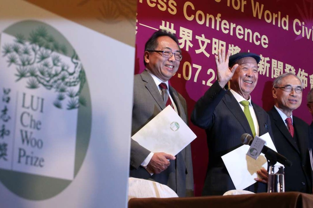 Announcing the Lui Che Woo Prize winners yesterday are (from left) Tsui Lap-chee, Lui Che-woo and Lawrence Lau. Photo: Felix Wong