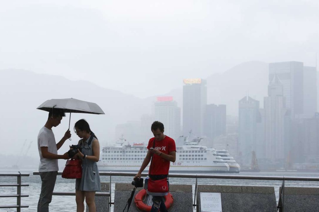 Rain falls on Victoria Harbour in the afternoon. Photo: Edward Wong