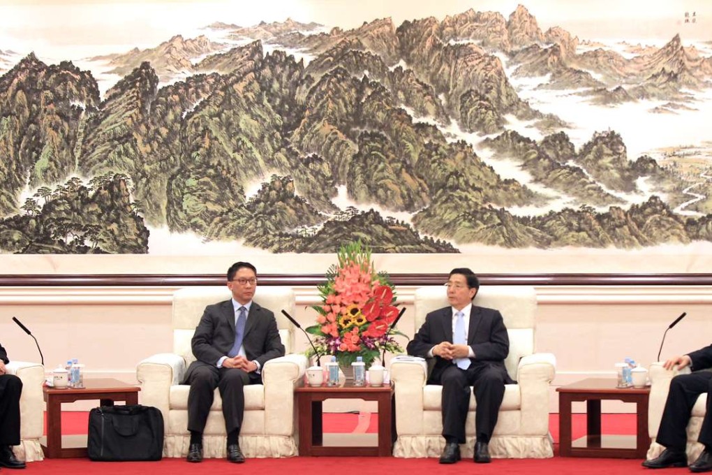 State Councilor Guo Shenkun and deputy minister of public security Chen Zhimin met with Hong Kong’s delegation, headed by Secretary for Justice Rimsky Yuen Kwok-keung and Secretary for Security Lai Tung-kwok in Beijing on July 5. Photo: Simon Song