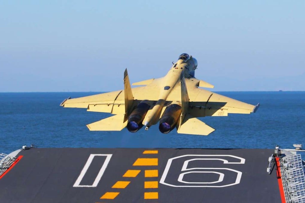A carrier-borne J-15 fighter jet takes off from the Liaoning aircraft carrier. Photo: Xinhua