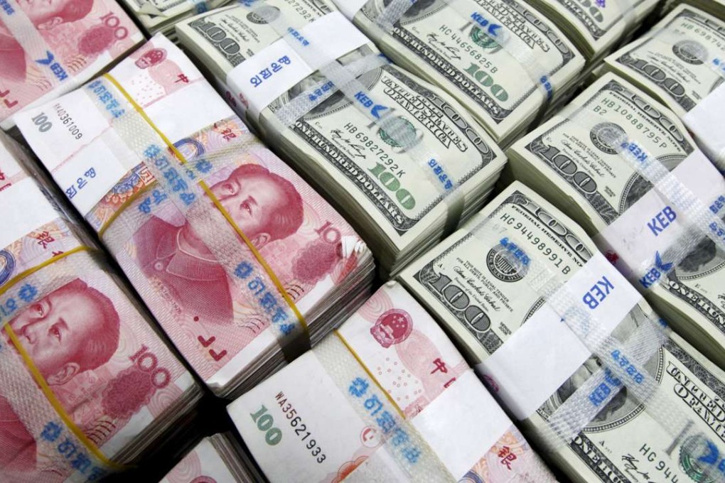 The People’s Bank of China on Wednesday set the yuan reference point against the US dollar at 6.6671, 107 basis points or 0.16 per cent stronger than on Tuesday. Photo: Reuters