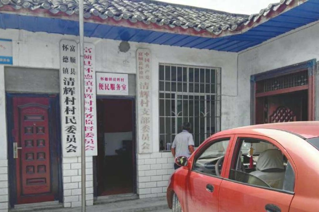 A man enters the village committee offices in Qinghui. Photo: SCMP Pictures