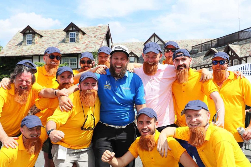Andrew Johnston poses with English golf fans during a practise round prior to the 2016 PGA Championship at Baltusrol Golf Club. Photo: AFP