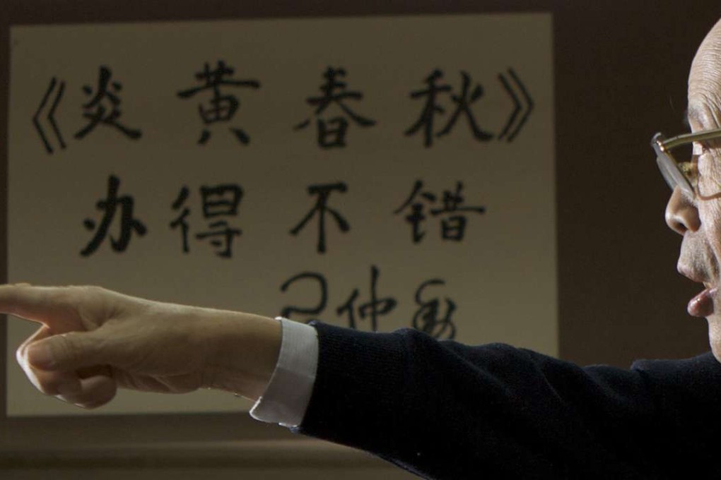Du Daozheng in his Beijing office eight years ago, with Xi Zhongxun’s calligraphy praising the magazine in the background. Photo: SCMP Pictures