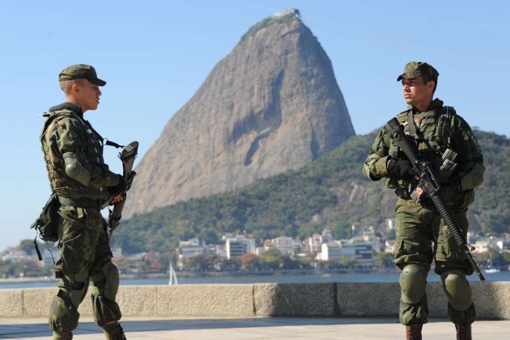 Marines stand guard at Flamengo Park in Rio de Janeiro, enhancing security ahead of the Games. Photo: AFP