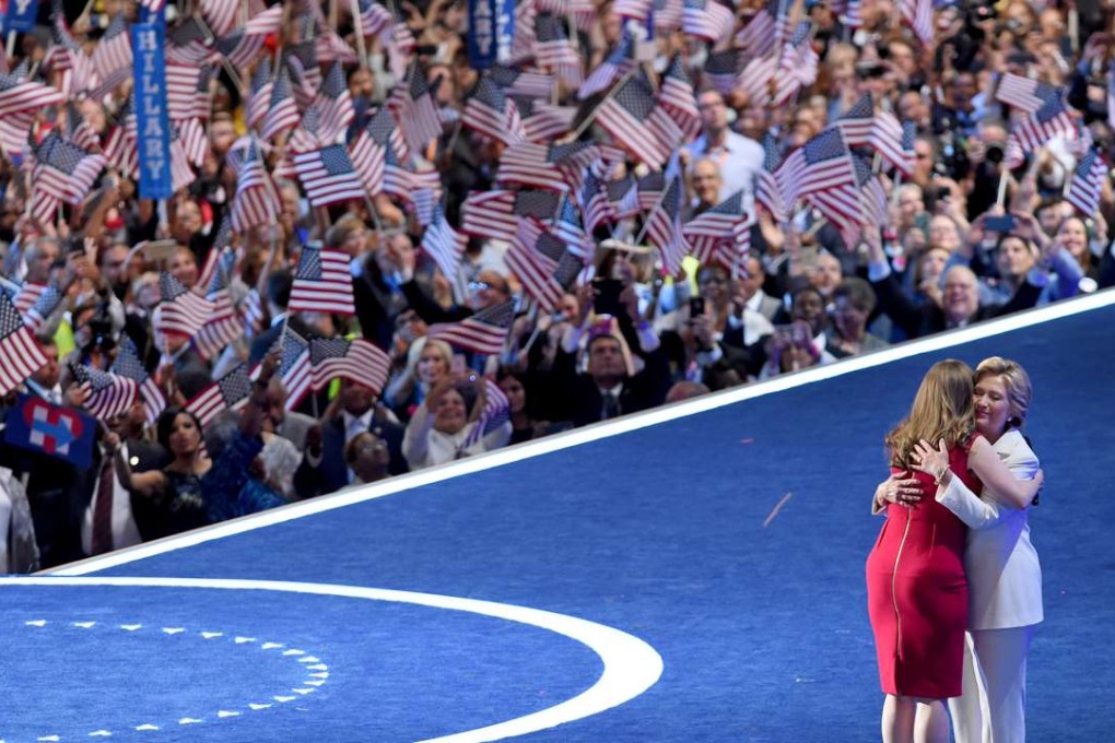 Hillary Clinton embraces daughter Chelsea during the last day of the Democratic National Convention at the Wells Fargo Center in Philadelphia on Thursday,. Photo: TNS