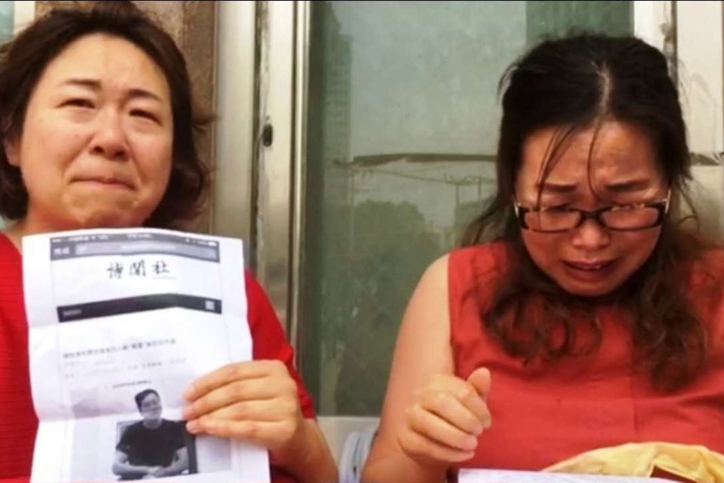 Wang Qiaolong, left, with Liu Ermin, photographed at a municipal courthouse in Tianjin on Friday. Photo: SCMP pictures
