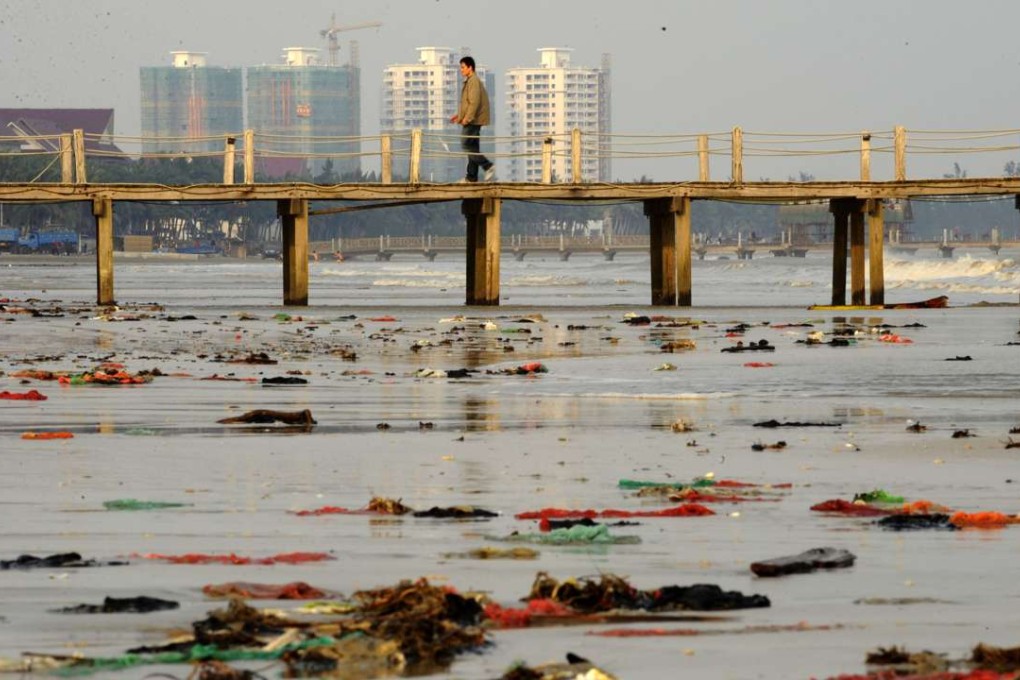China s rapidly transforming into an urban, industrial country and generating immeasurable amounts of waste in the process. Photo: China Foto Press