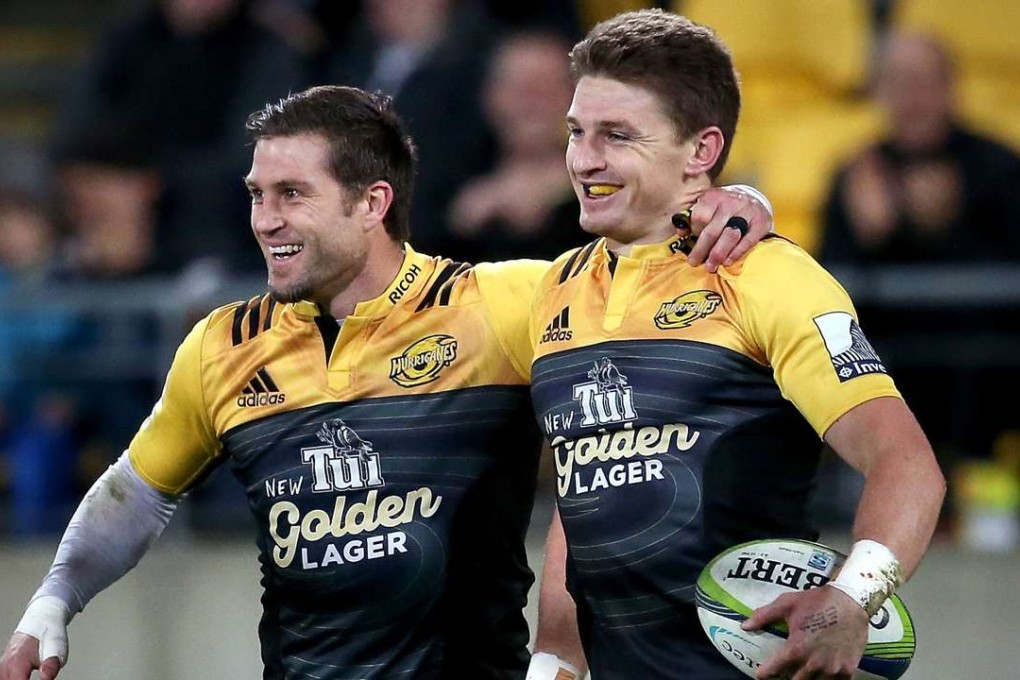 Hurricanes fly-half Beauden Barrett (right) celebrates with team-mate Cory Jane. Photo: AFP