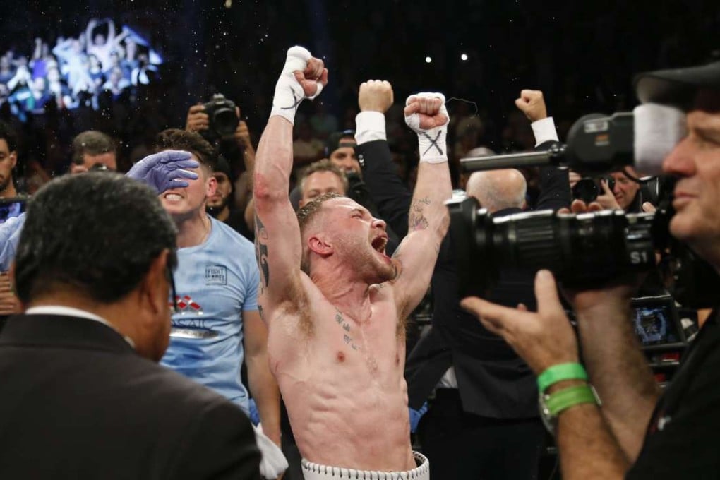 Britain’s Carl Frampton celebrates winning the WBA super world featherweight crown after defeating champion Leo Santa Cruz by decision at Barclays Centre. Photo:US Today