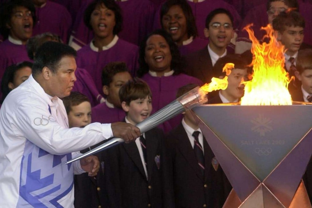 Muhammad Ali returned to light the torch at the Salt Lake City Games in 2002. He first delighted spectators at the opening ceremony of the 1996 Atlanta Games when he lit the Olympic torch. Photo: AFP