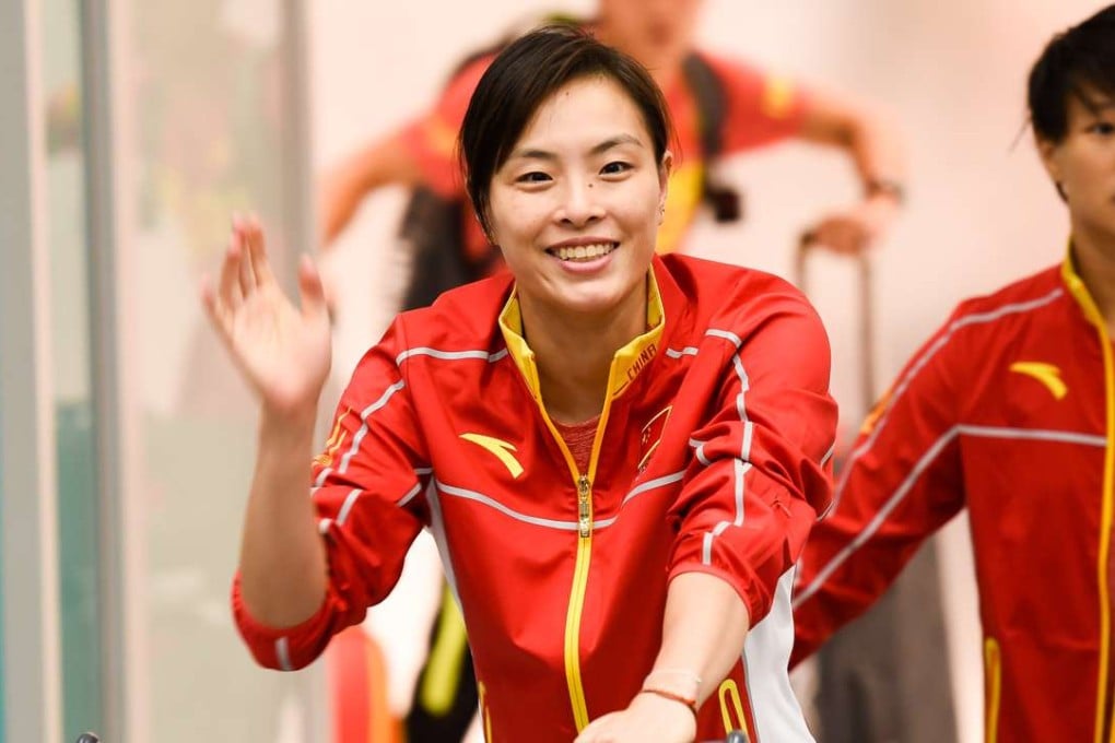 Chinese diver Wu Minxia arrives at the airport in Rio de Janeiro. Photo: Xinhua