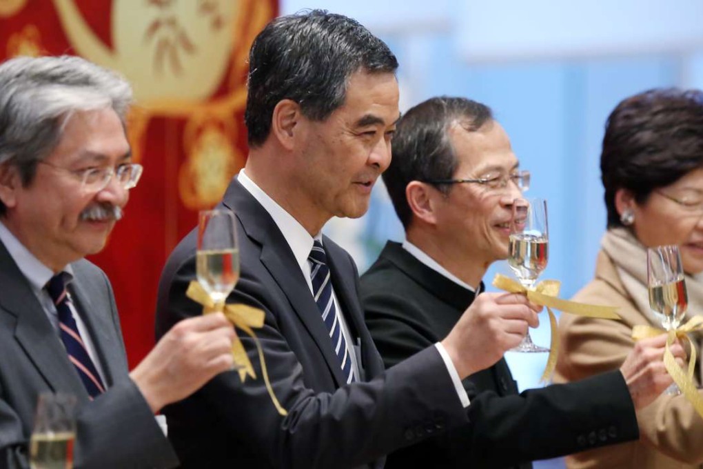 Financial Secretary John Tsang, Chief Executive Leung Chun-ying, Legco president Jasper Tsang and Chief Secretary Carrie Lam attend a reception this year. John Tsang and Jasper Tsang have said they will consider running in the chief executive race next year. Photo: Sam Tsang