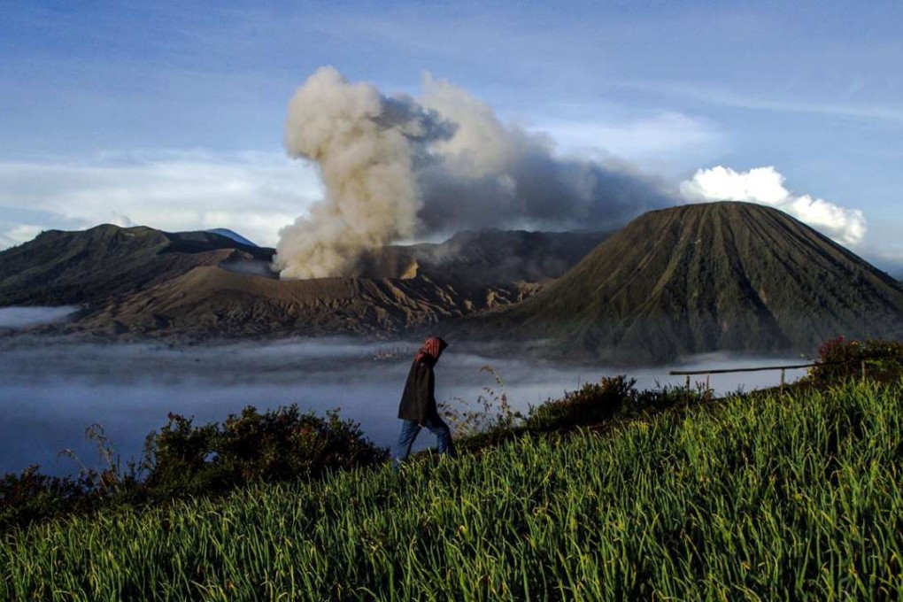 Mount Bromo spews ashes into the air during a volcanic eruption ahead of the Hindus Kasada ceremony in Probolinggo, East Java, Indonesia, 20 July 2016. Photo: EPA
