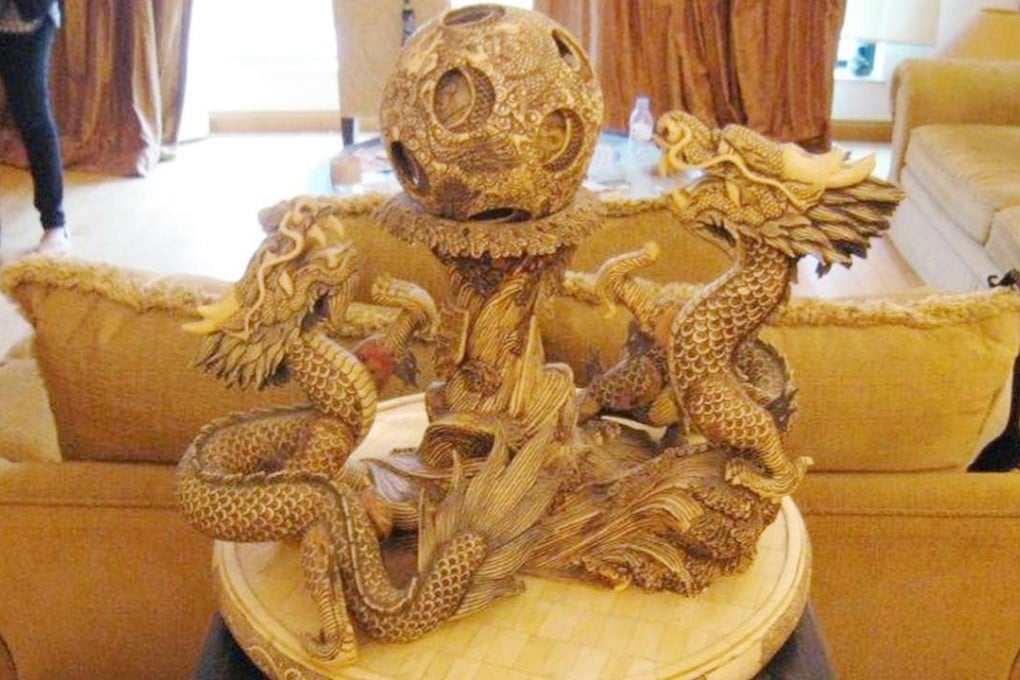 The latest auction of a variety of items, including Chinese paintings, sculptures, collectible banknotes, stamps and souvenirs, comes after two separate public tenders offering part of Hui's private collection fetched at least HK$560,000 last year. Photo: SCMP PicturesPicture shows Rafael Hui Si Yan's personal collection will be in action.
